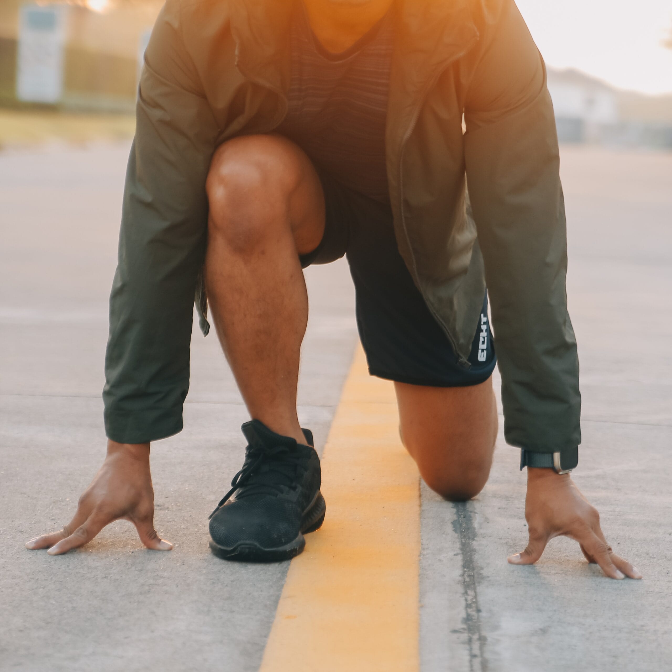 Athlete runner feet running on road, Jogging concept at outdoors. Man running for exercise.